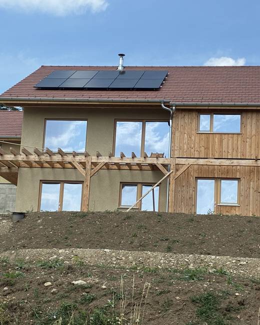 Maison à ossature bois avec enduit sur isolation